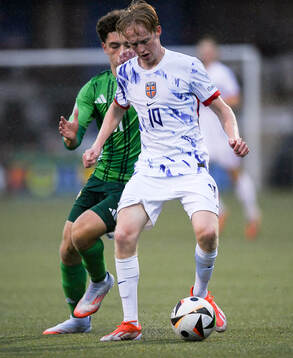 Sondre Granaas of Norway in action against Kieran Morrison