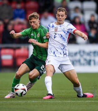 Aodhan Doherty of Northern Ireland in action against Filip