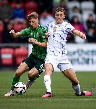 Aodhan Doherty of Northern Ireland in action against Filip