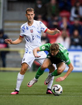 Filip Loftesnes-Bjune of Norway in action against Aodhan