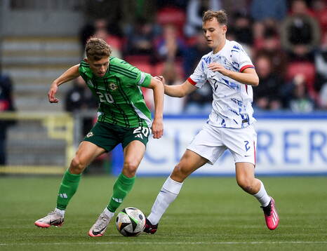 Filip Loftesnes-Bjune of Norway in action against Aodhan