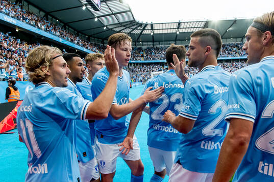 Players of Malmö FF celebrate the 1-0 goal by Lasse Berg