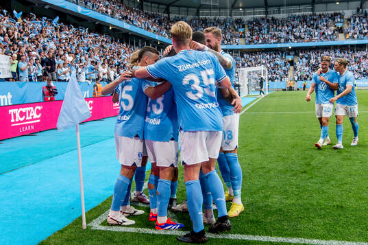 Players of Malmö FF celebrate the 3-0 goal by Lasse Berg