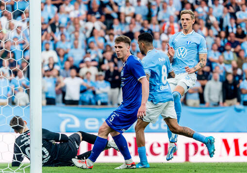 Søren Rieks of Malmö FF scores the 4-1 goal behind