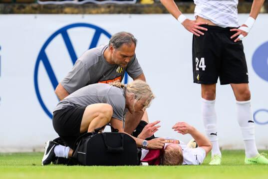 Mikkel Rygaard Jensen of Häcken recieves medical treatment