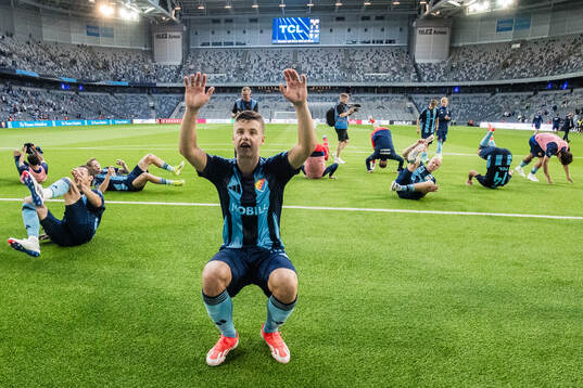 Samuel Dahl of Djurgården celebrates with team mates