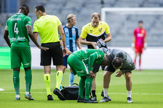 Chris Lybohy of Progres Niederkorn in pain the UEFA