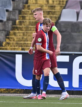 Simen Vatne Haram, right, celebrates with Norway teammate