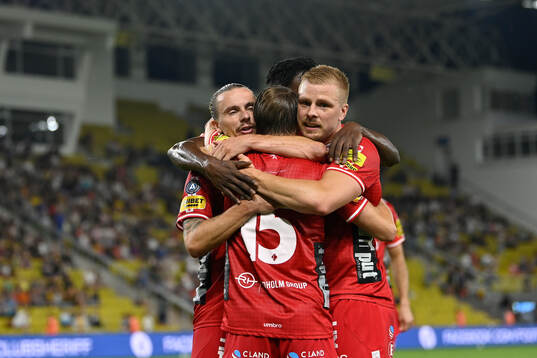 Simon Hedlund of Elfsborg celebrates with teammates