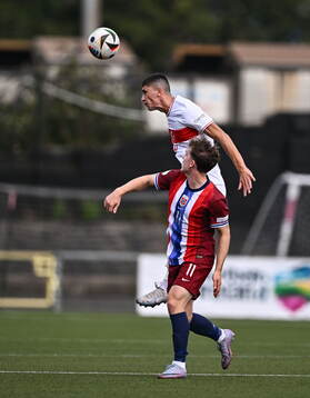 Diren Dagdeviren of Turkiye in action against Edvin Austbø