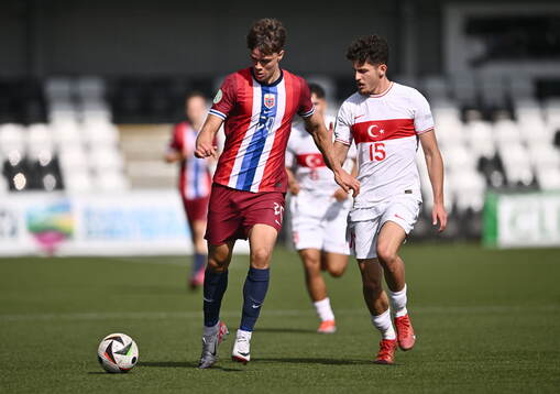 Daniel Braut of Norway in action against Emirhan Basyigit