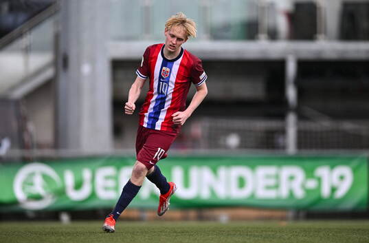 Sondre Granaas of Norway celebrates