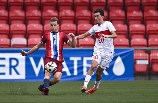 Filip Loftesnes-Bjune of Norway in action against Emre Uzun