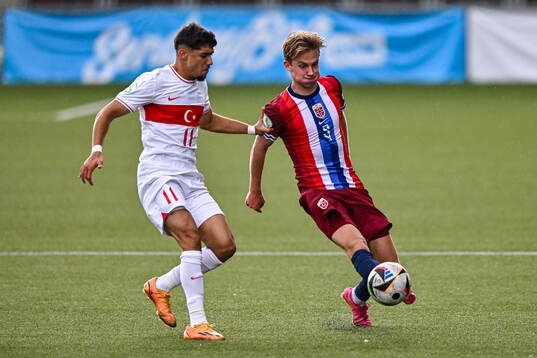 Rasmus Holten of Norway in action against Emirhan Demircan