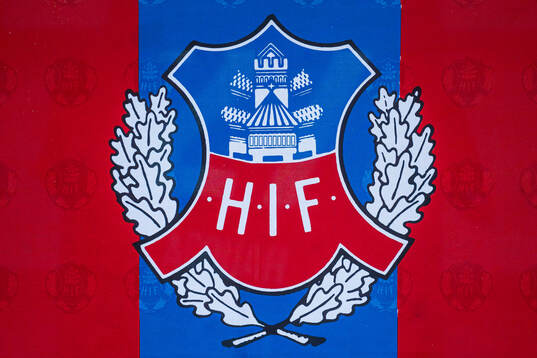 Helsingborgs klubbmärke på en flagga