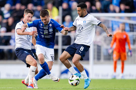 Lasse Berg Johnsen and Sergio Pena Flores of Malmö FF and