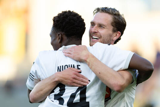 Severin Nioule of Häcken celebrates with +Adam Lundqvist