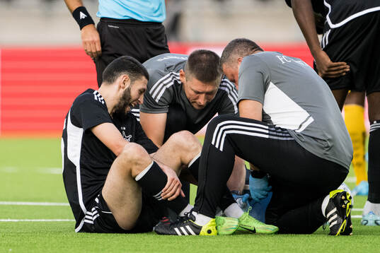 Ayyoub Allach of Sheriff Tiraspol in pain