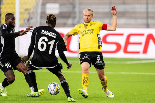 Cedric Badolo of Sheriff Tiraspol and Johan Larsson of