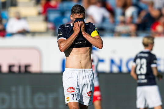 Gustav Valsvik of Strømsgodset looks dejected