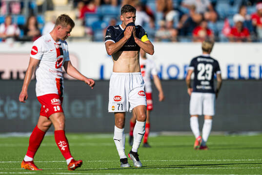 Gustav Valsvik of Strømsgodset looks dejected