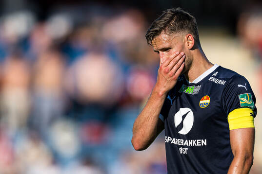 Gustav Valsvik of Strømsgodset looks dejected
