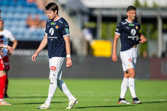 Lars-Christopher Vilsvik of Strømsgodset looks dejected