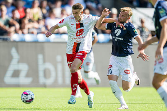 Emil Kornvig of Brann and Herman Stengel of Strømsgodset