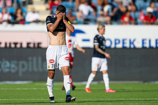 Gustav Valsvik of Strømsgodset looks dejected