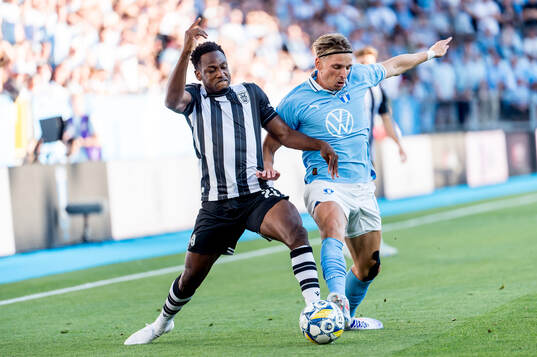 Abdul Rahman Baba of PAOK and Jens Stryger of Malmö FF