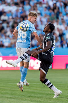 Hugo Bolin of Malmö FF and Abdul Rahman Baba of PAOK