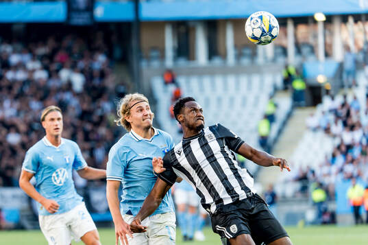 Sebastian Nanasi of Malmö FF and Abdul Rahman Baba of PAOK