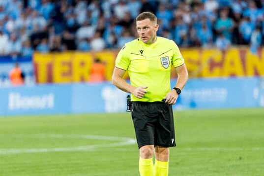 Referee John Beaton