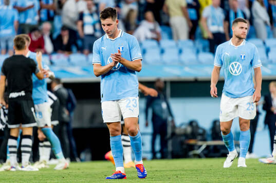 Lasse Berg Johnsen of Malmö FF looks dejected