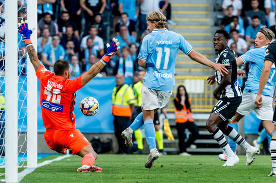 Goalkeeper Dominik Kotarski of PAOK and Sebastian Nanasi of