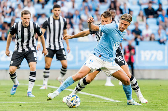 Erik Botheim of Malmö FF and Stefan Schwab of PAOK