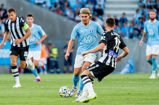 Sebastian Nanasi of Malmö FF and Andrija Zivkovic of PAOK