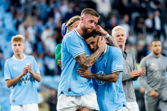 Pontus Jansson and Sergio Pena of Malmö FF looks dejected