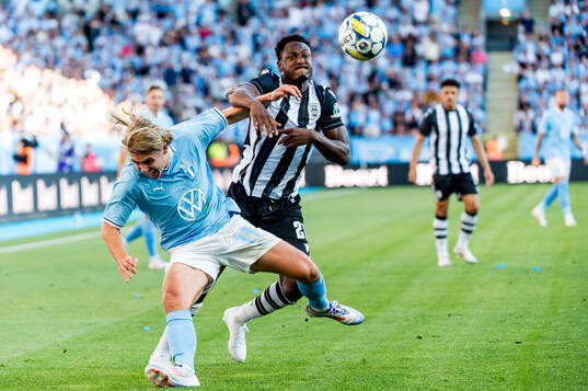 Sebastian Nanasi of Malmö FF and Abdul Rahman Baba of PAOK