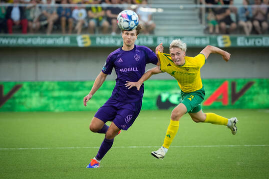 Rasmus Schüller of Djurgården  and Santeri Haarala