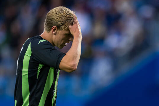 Jesper Daland of Cercle Brugge looks dejected