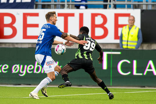 Anders Hagelskjær of Molde and Faso Abdoul Kader Ouattara