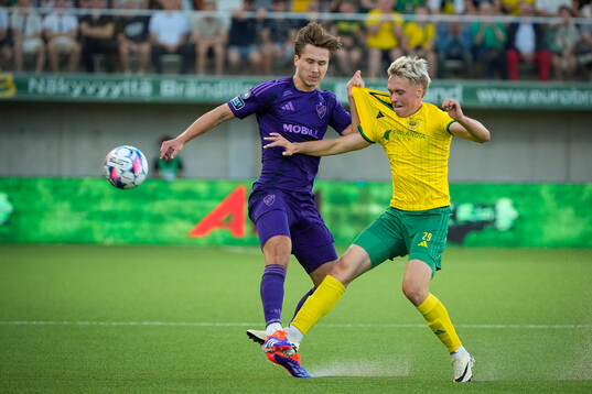 Rasmus Schüller of Djurgården  and Santeri Haarala