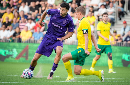 Deniz Hümmet of Djurgården  and Tatu Miettunen of Ilves