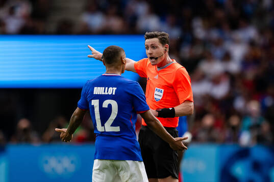 Enzo Millot of France reacts in the men’s football final
