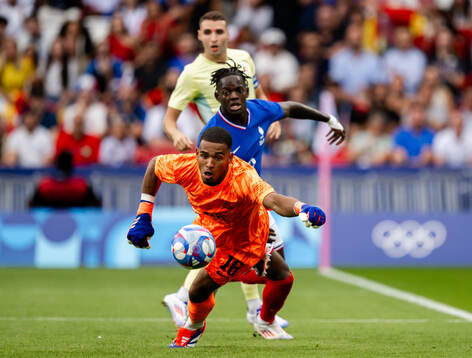 Fermin Lopez of Spain, not pictured, scores the 12- goal