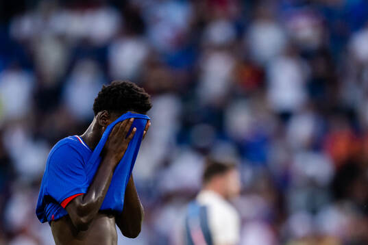 Soungoutou Magassa of France looks dejected