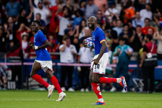 Jean-Philippe Mateta of France celebrates the 3-3 goal in