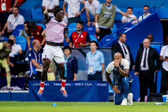 Head coach Thierry Henry of France looks dejected in the