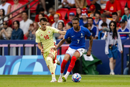 Aimar Oroz of Spain and Michael Olise of France in the